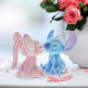 Flocked Kissing Stitch and Angel Figurines